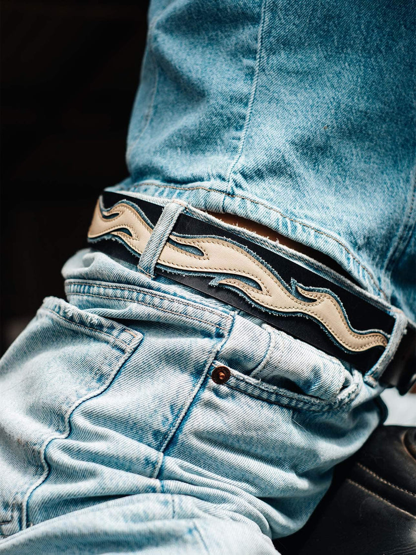 Elevate your style with our Flame Belt, a must-have accessory combining full-grain leather and light washed denim. Handcrafted with precision,