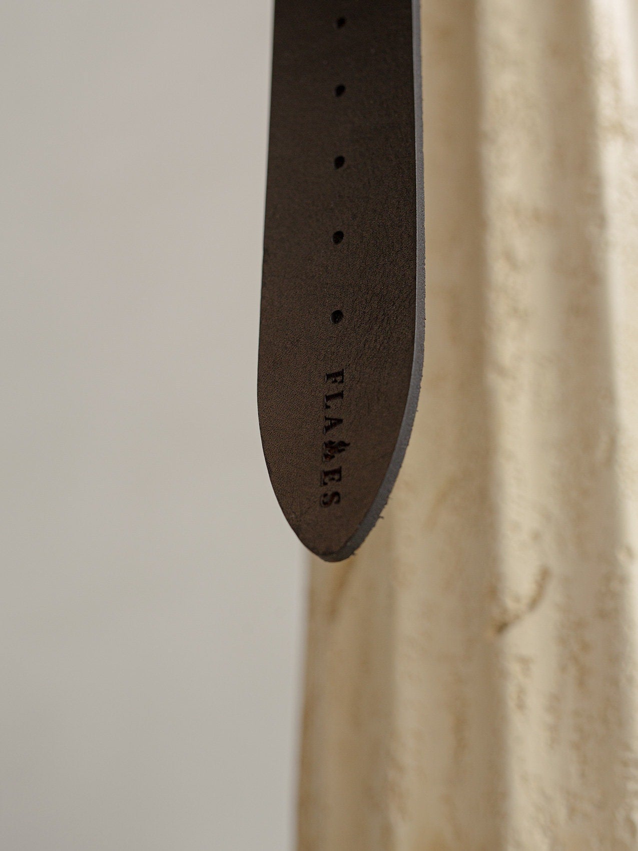 Flames logo engraving belt